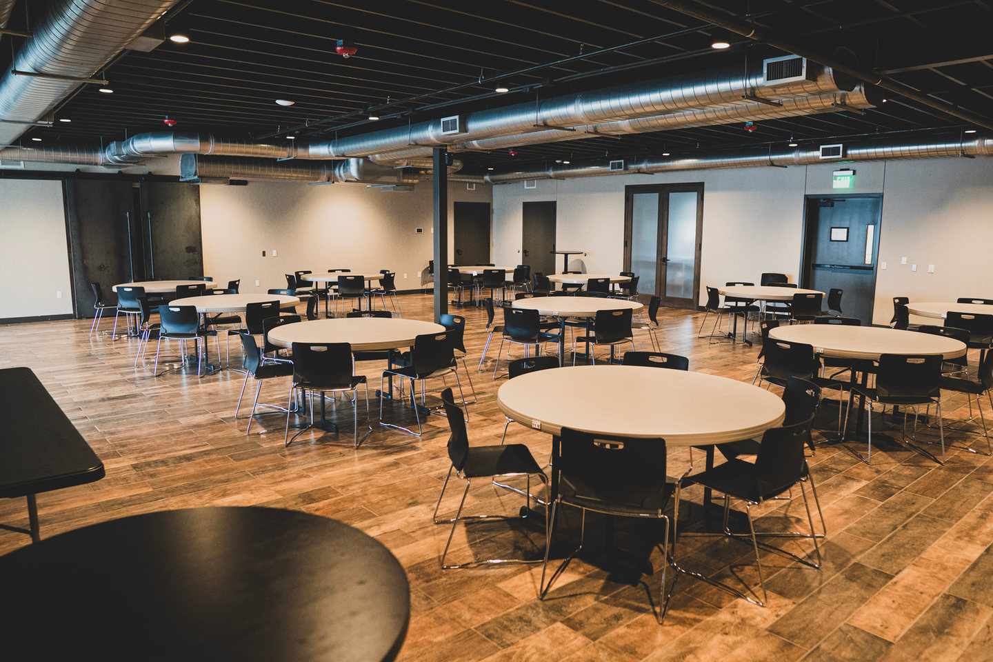 Upper Reception Hall in Ashland arranged with round tables