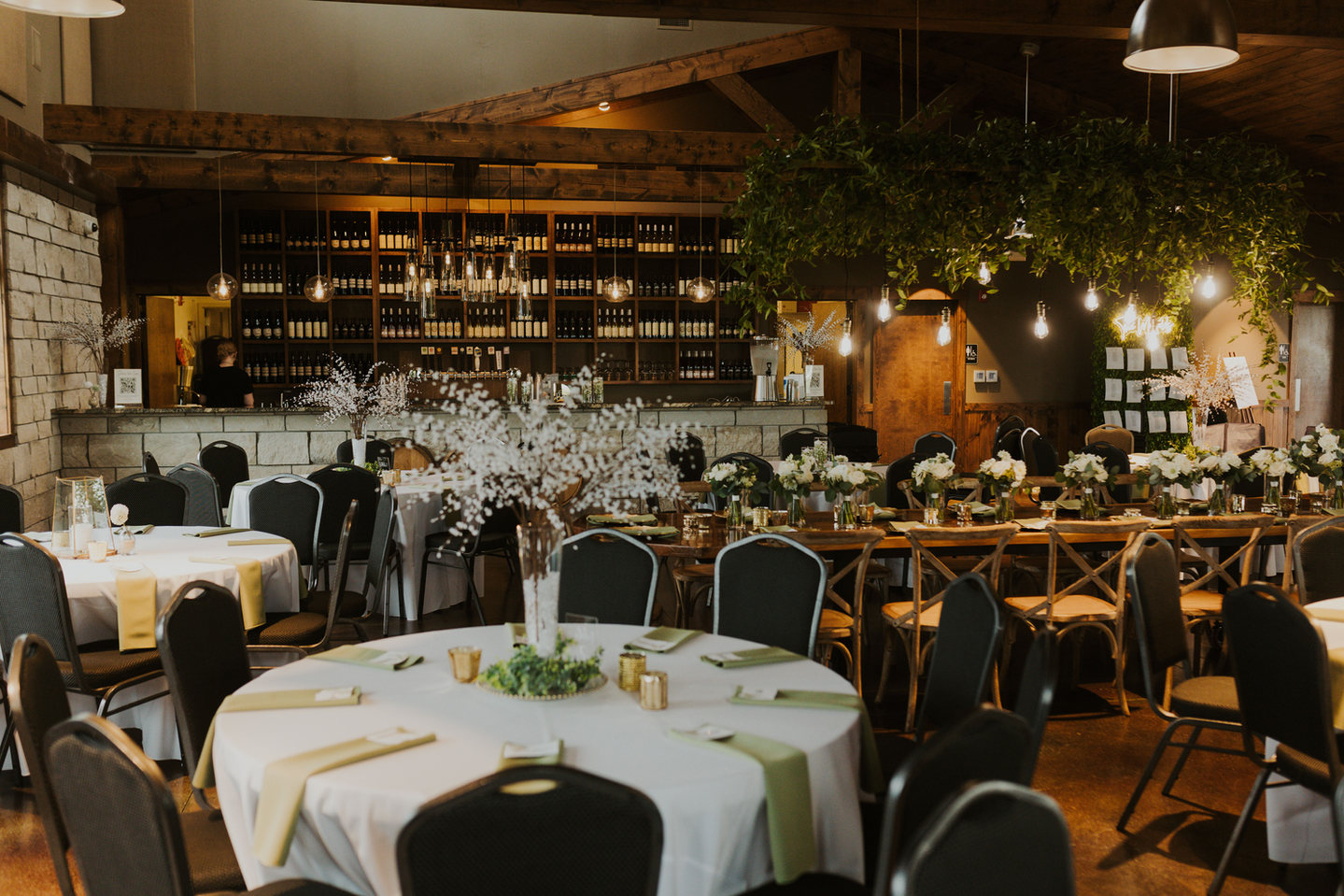 The vineyard Main Hall with tables arranged for a seated event